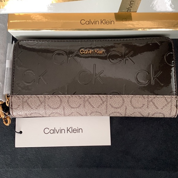Calvin Klein Handbags - Calvin Klein Monogram Zipper Wallet
